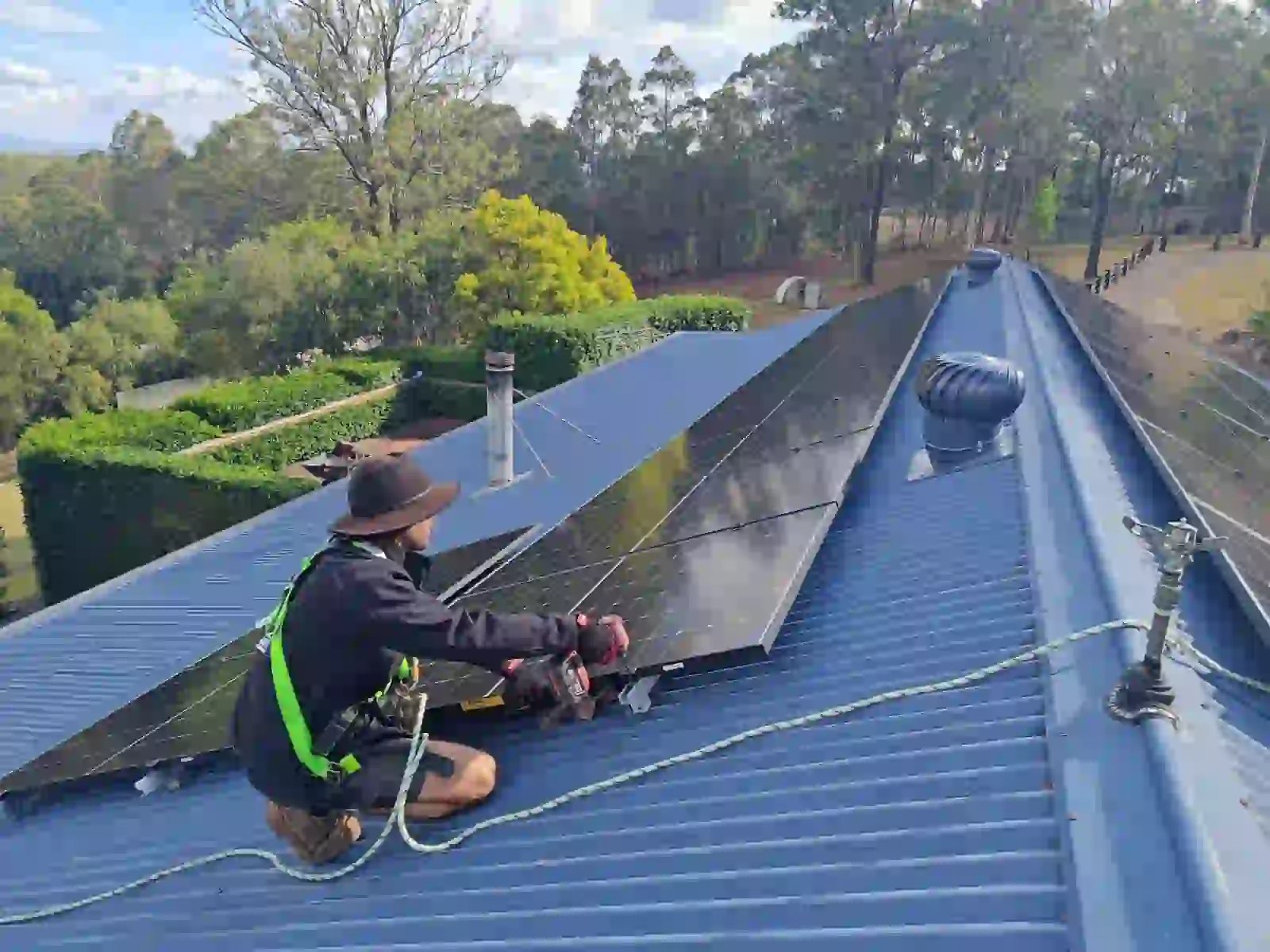 Solar panel installation underway on a Sawyers Gully roof in the Cessnock Coalfields