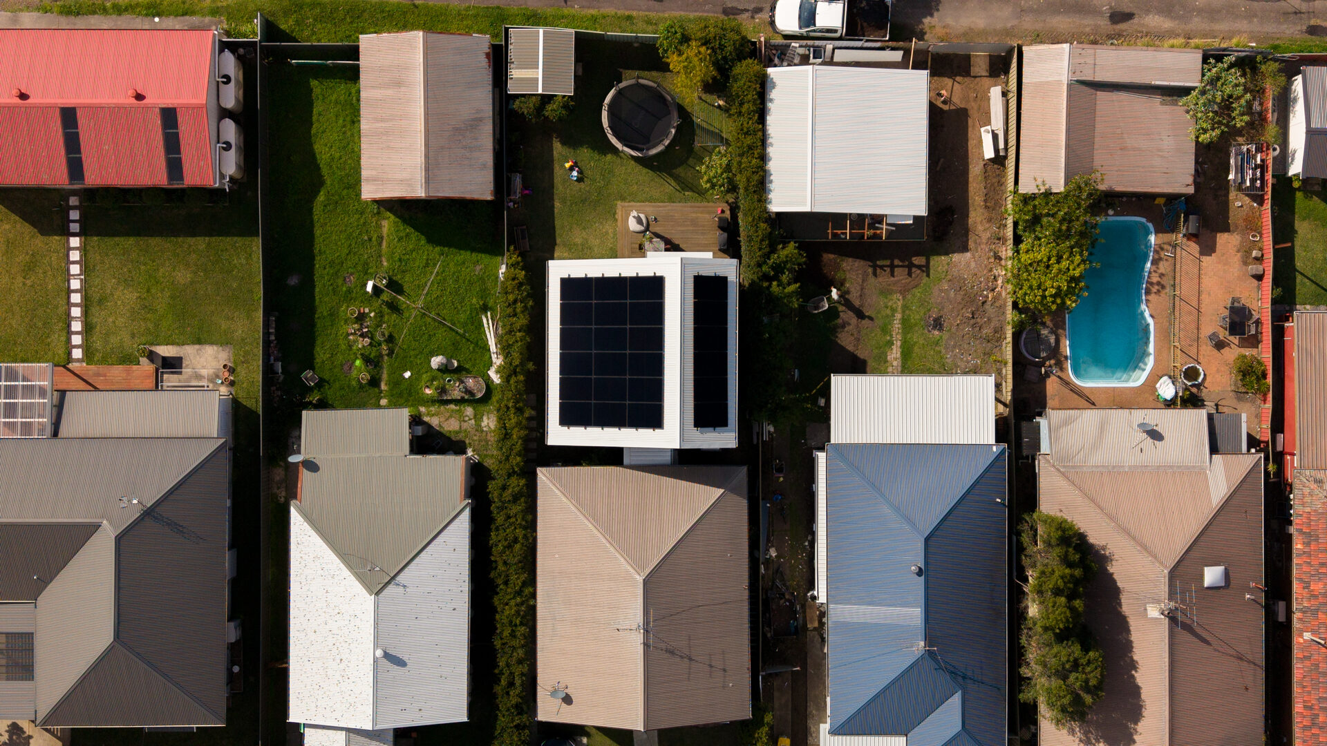 Wide aerial of the Mayfield solar installation and street