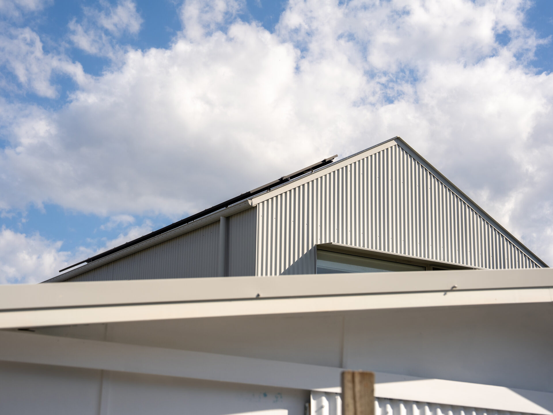 Newy Solar Co electrician installing panels in Mayfield