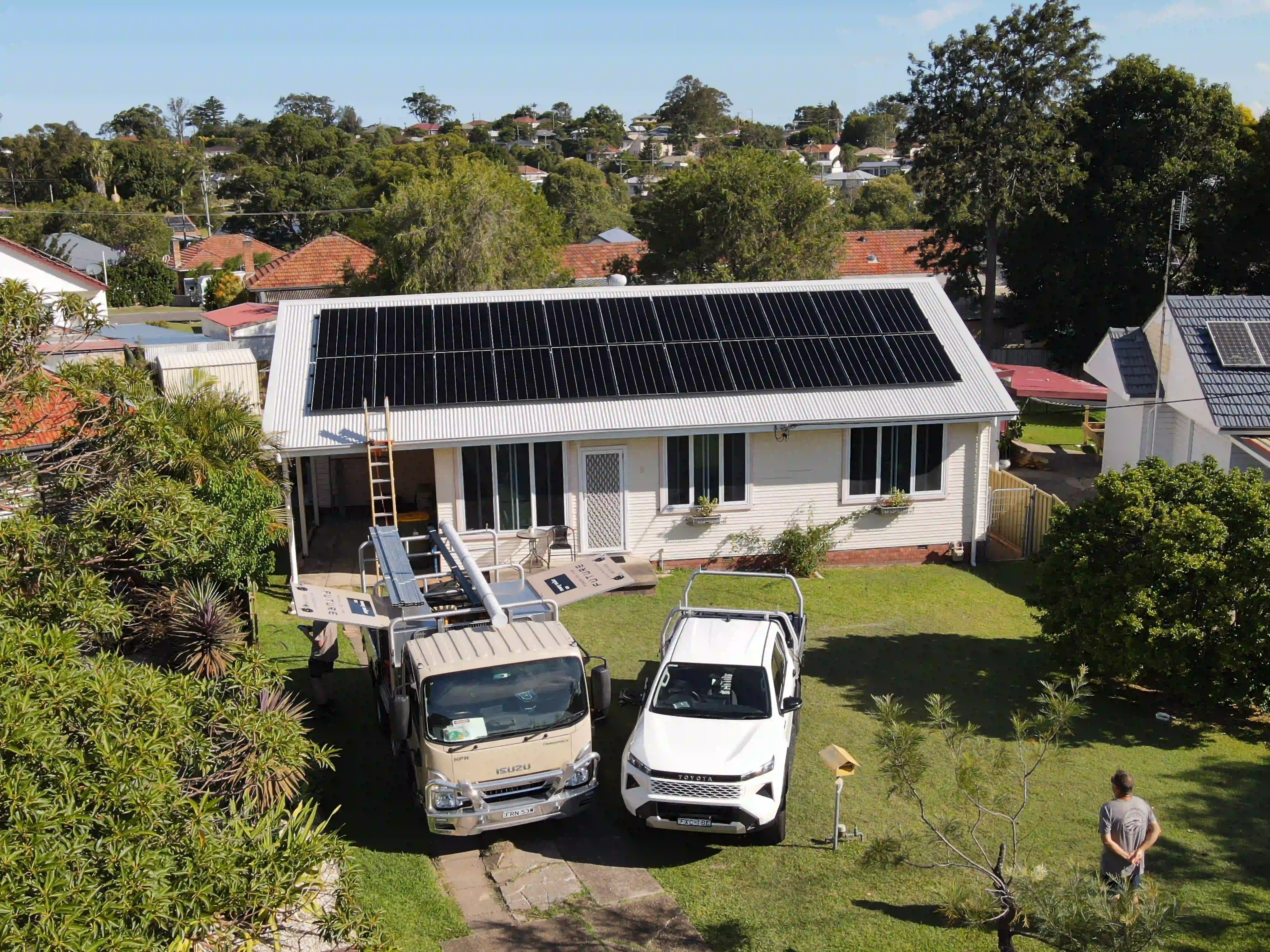 Overhead drone shot of solar panels on a Shortland rooftop