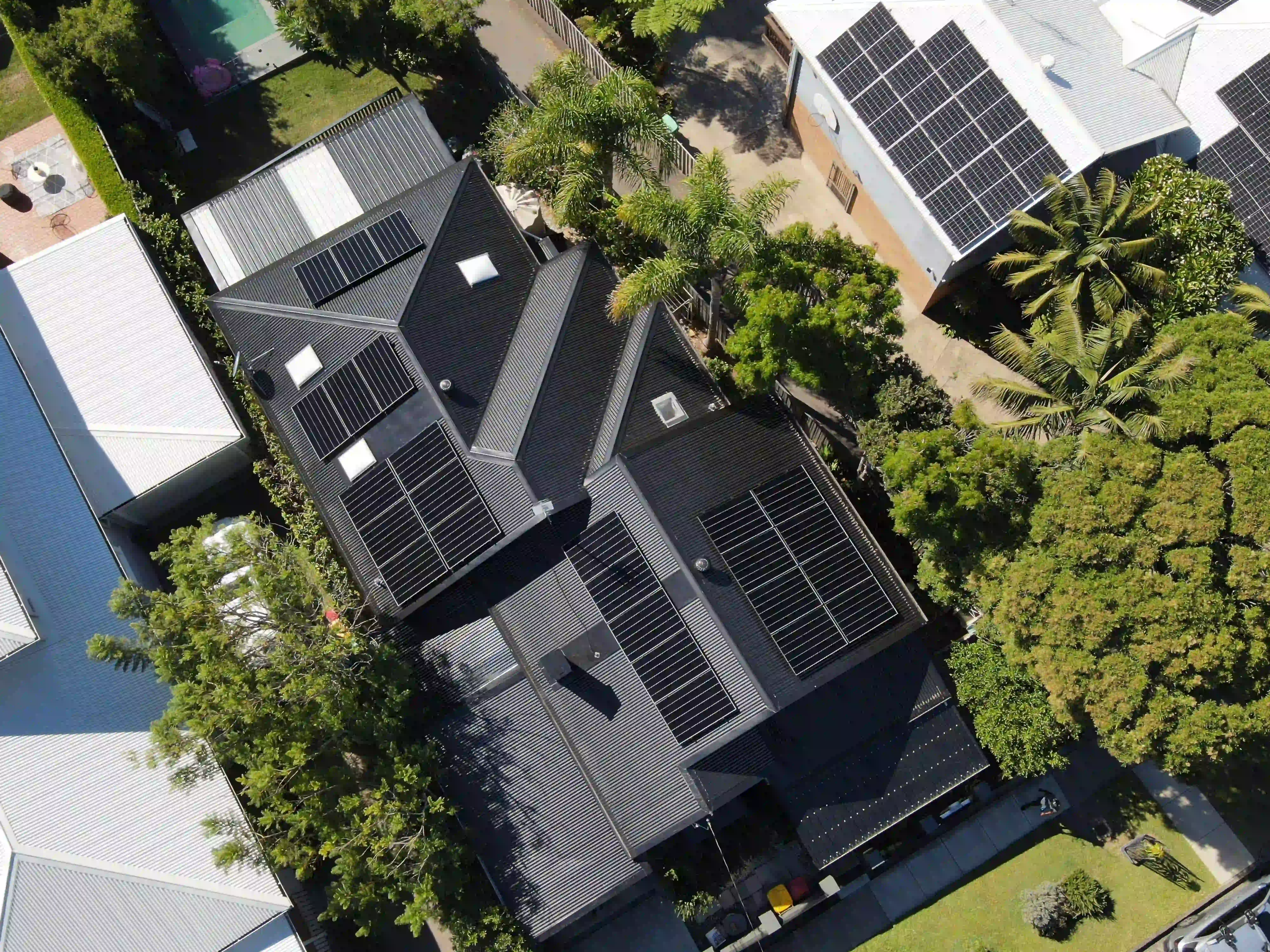 Overhead drone shot of solar panels on a Merewether rooftop