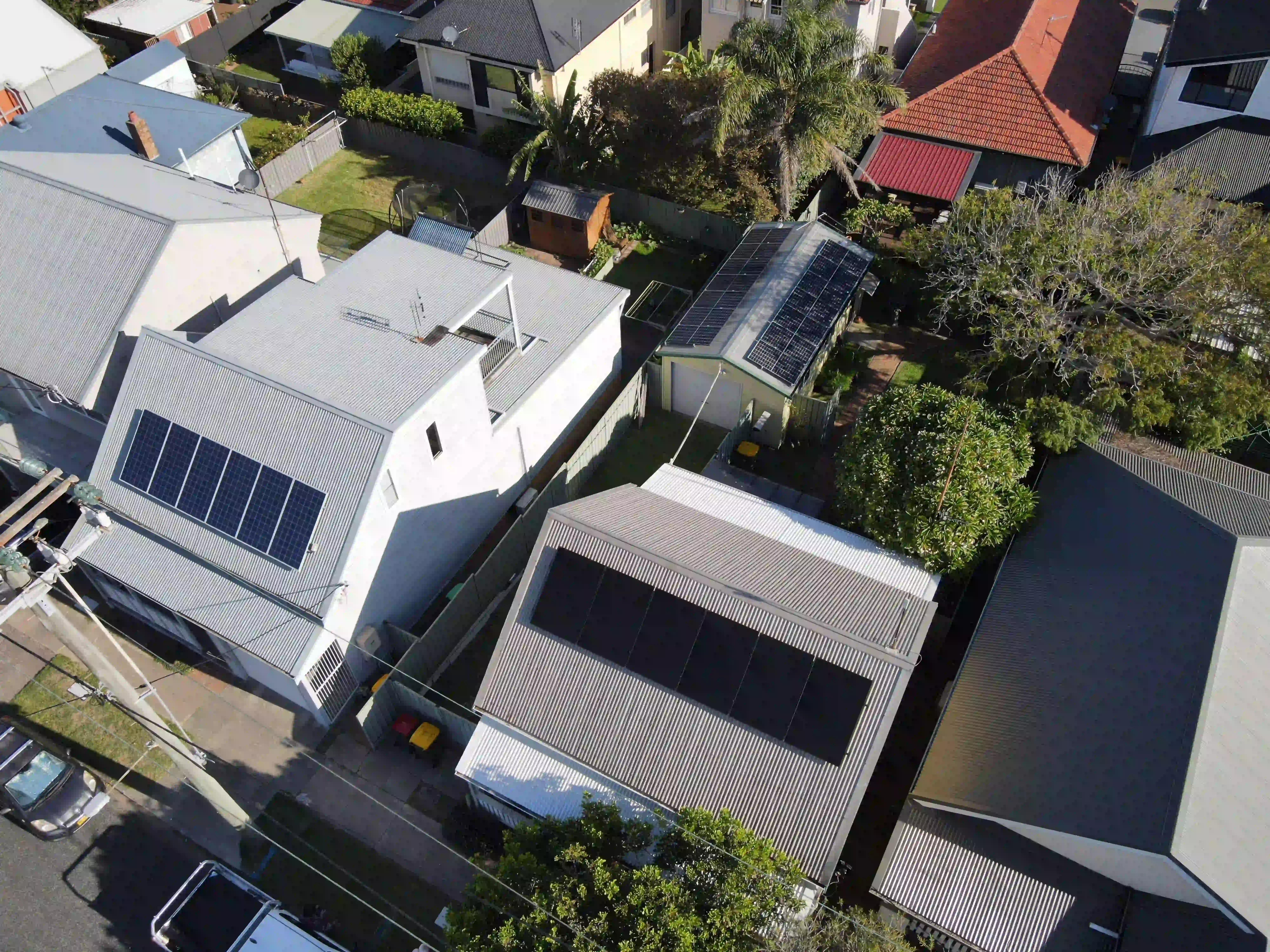 Wide aerial of a Stockton home with rooftop solar installed by Newy Solar Co
