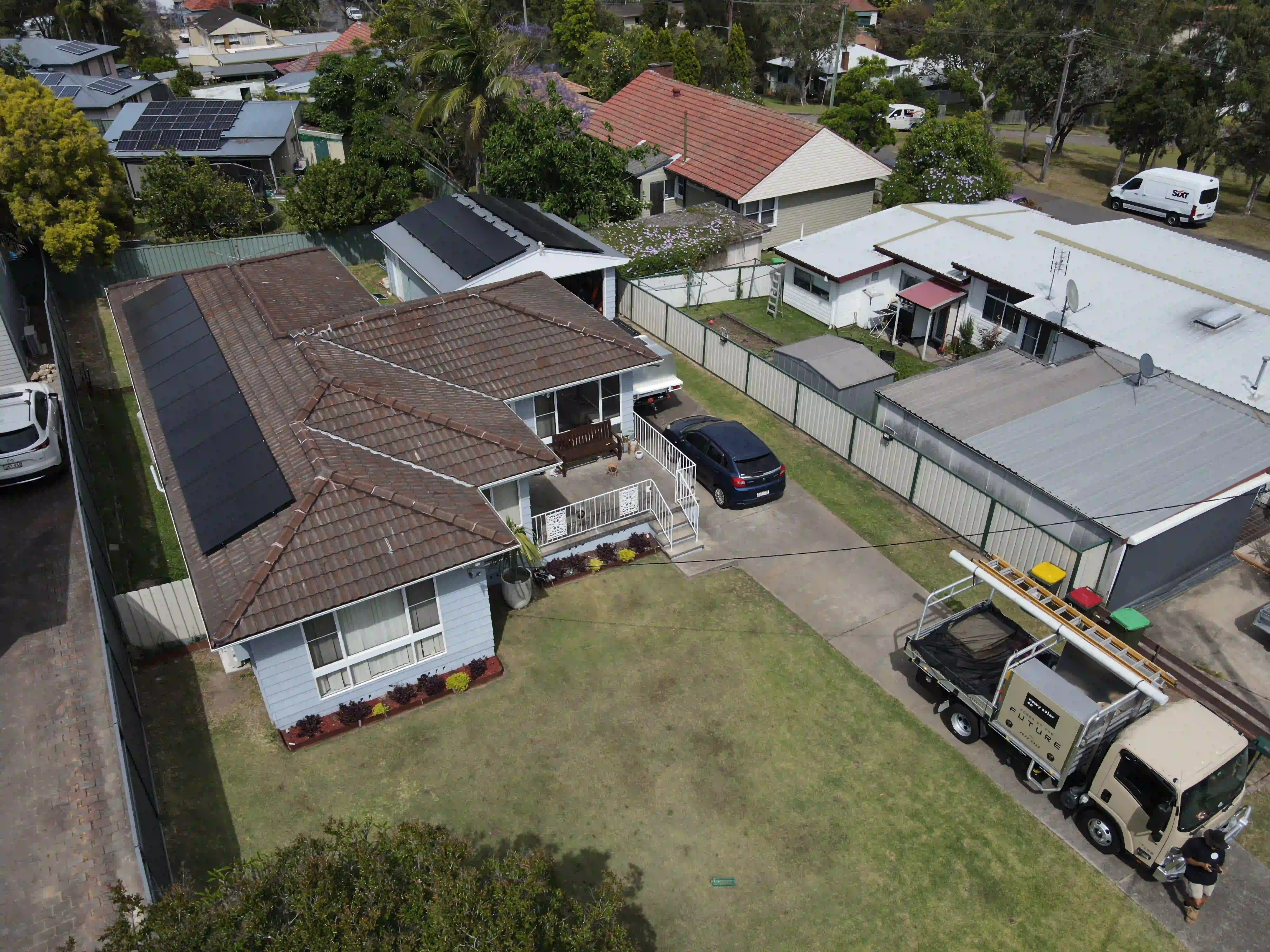 Drone view of rooftop solar panels installed by Newy Solar Co in Waratah, Newcastle