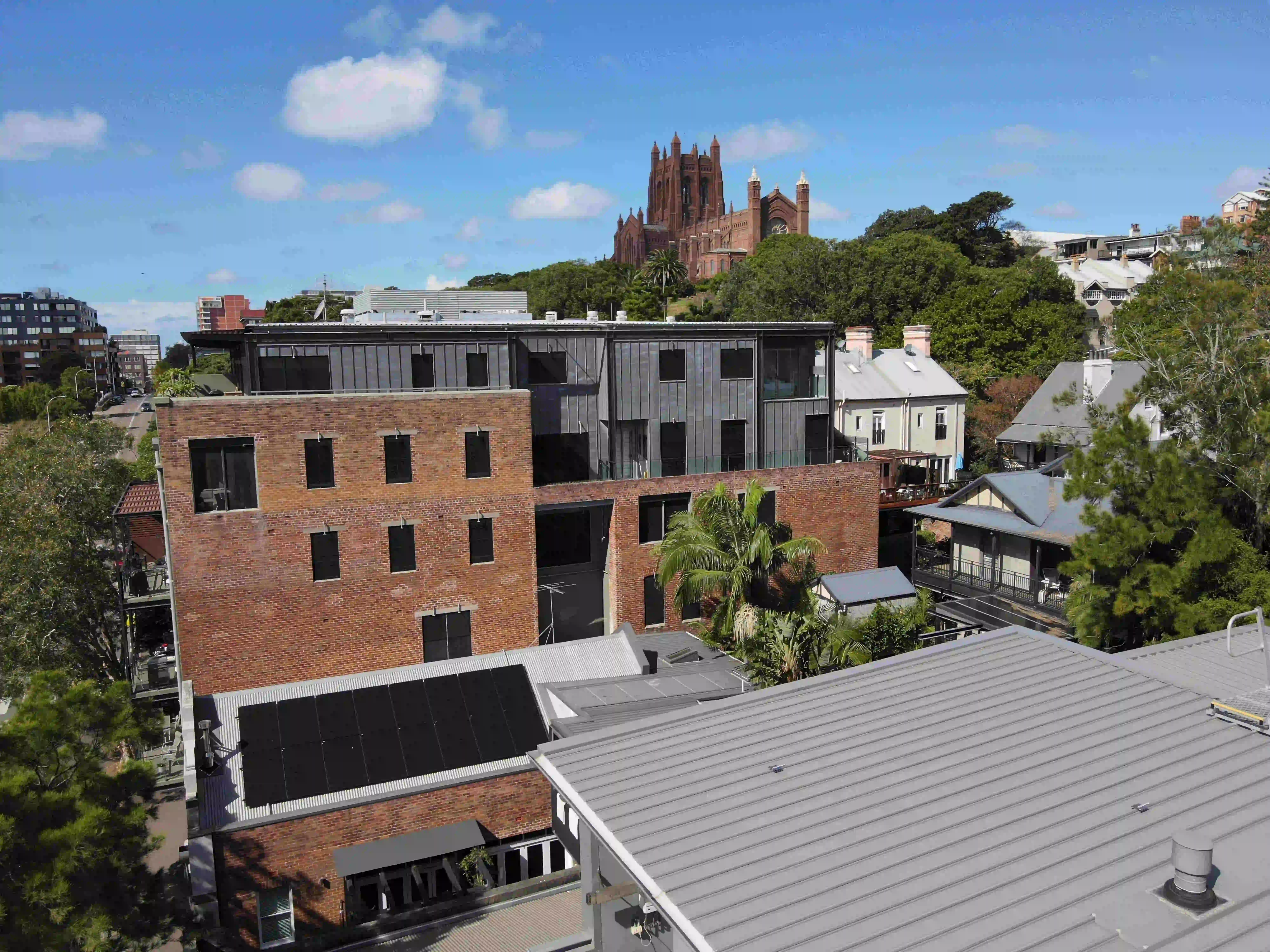 Solar panels installed on a King Street rooftop in Newcastle city
