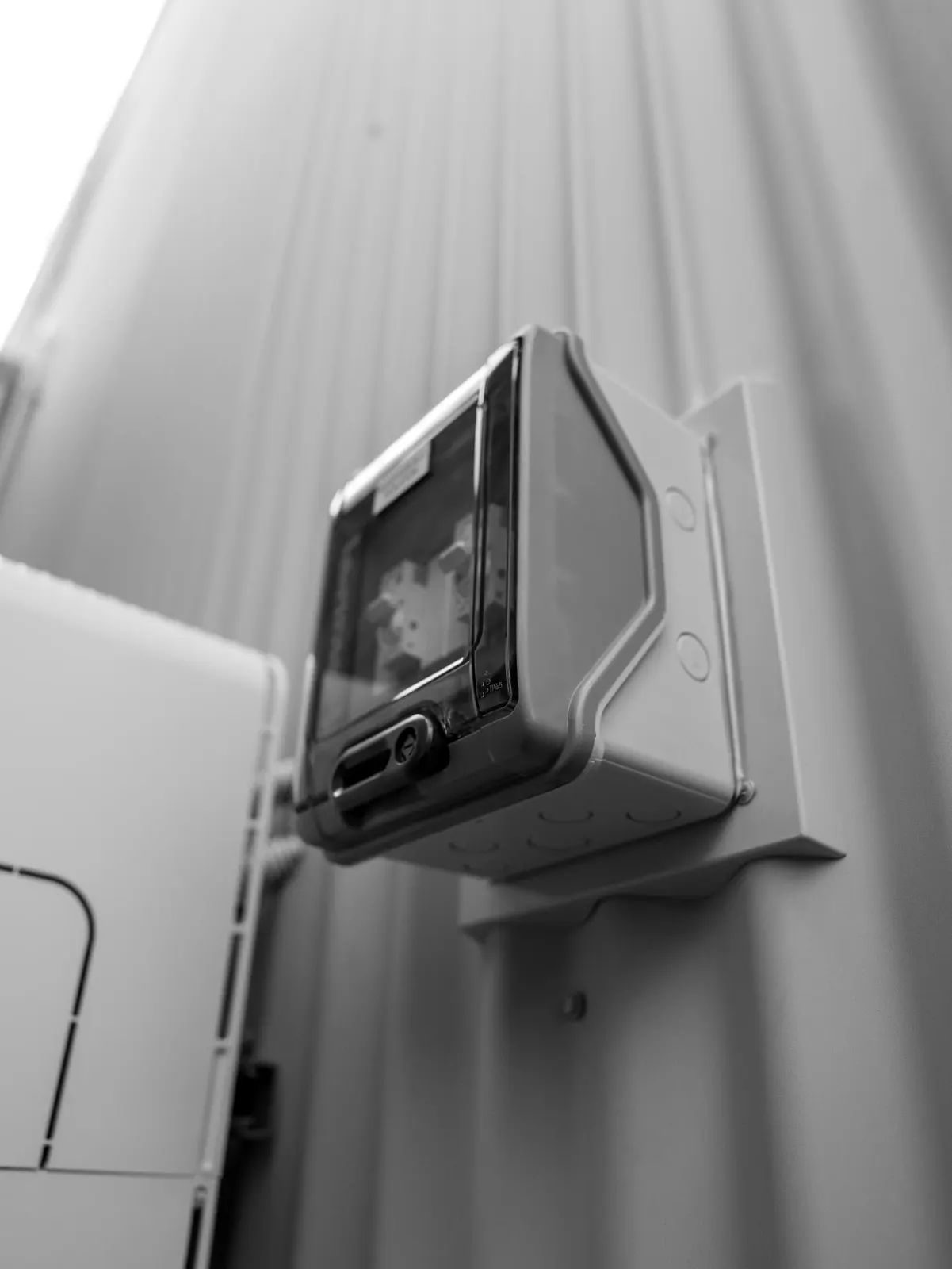 Weatherproof battery isolator beside a GoodWe ESA installation in Mayfield