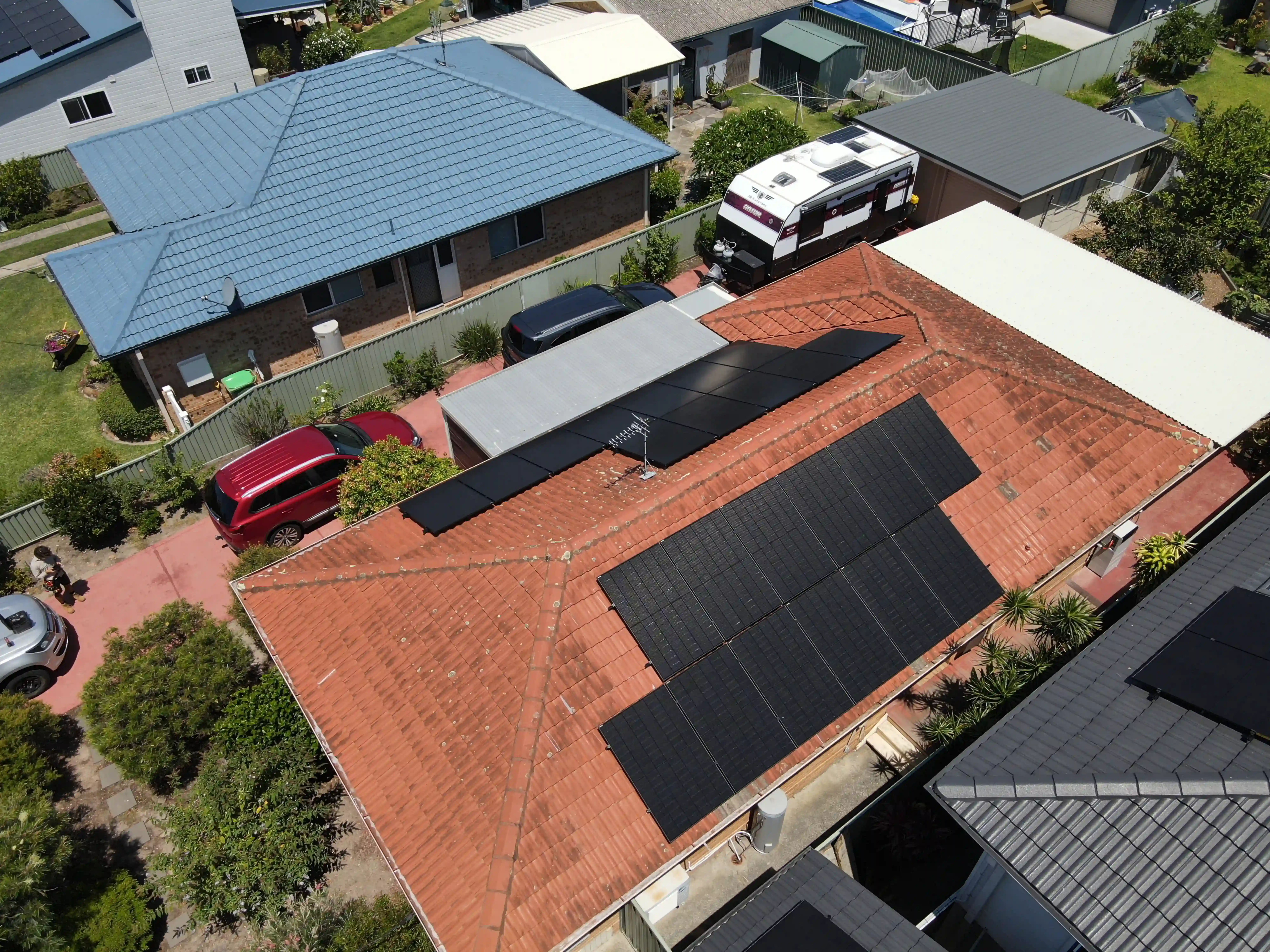 Overhead drone shot of the completed Fletcher rooftop solar array