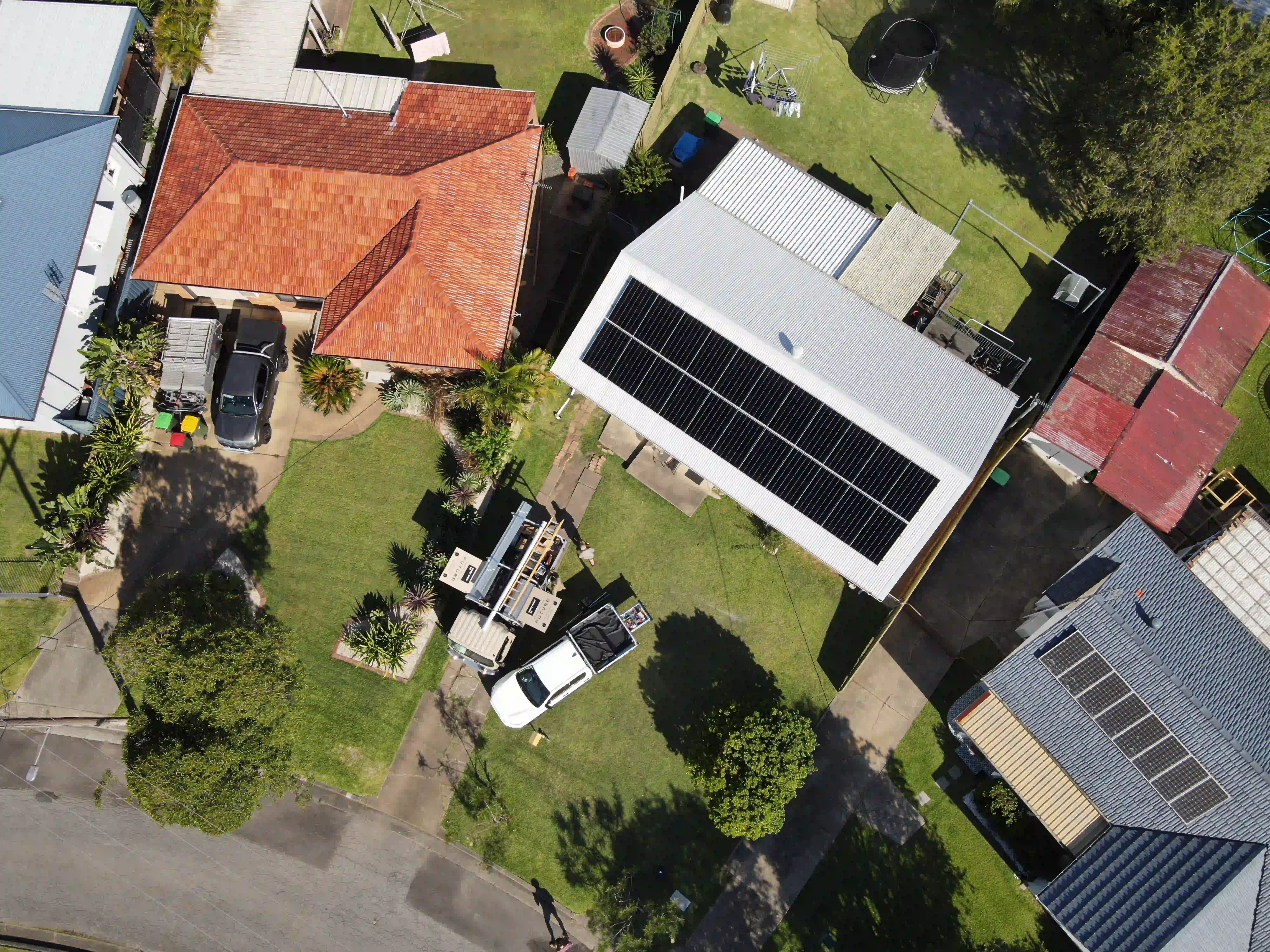Wide aerial of a Shortland home with rooftop solar installed by Newy Solar Co