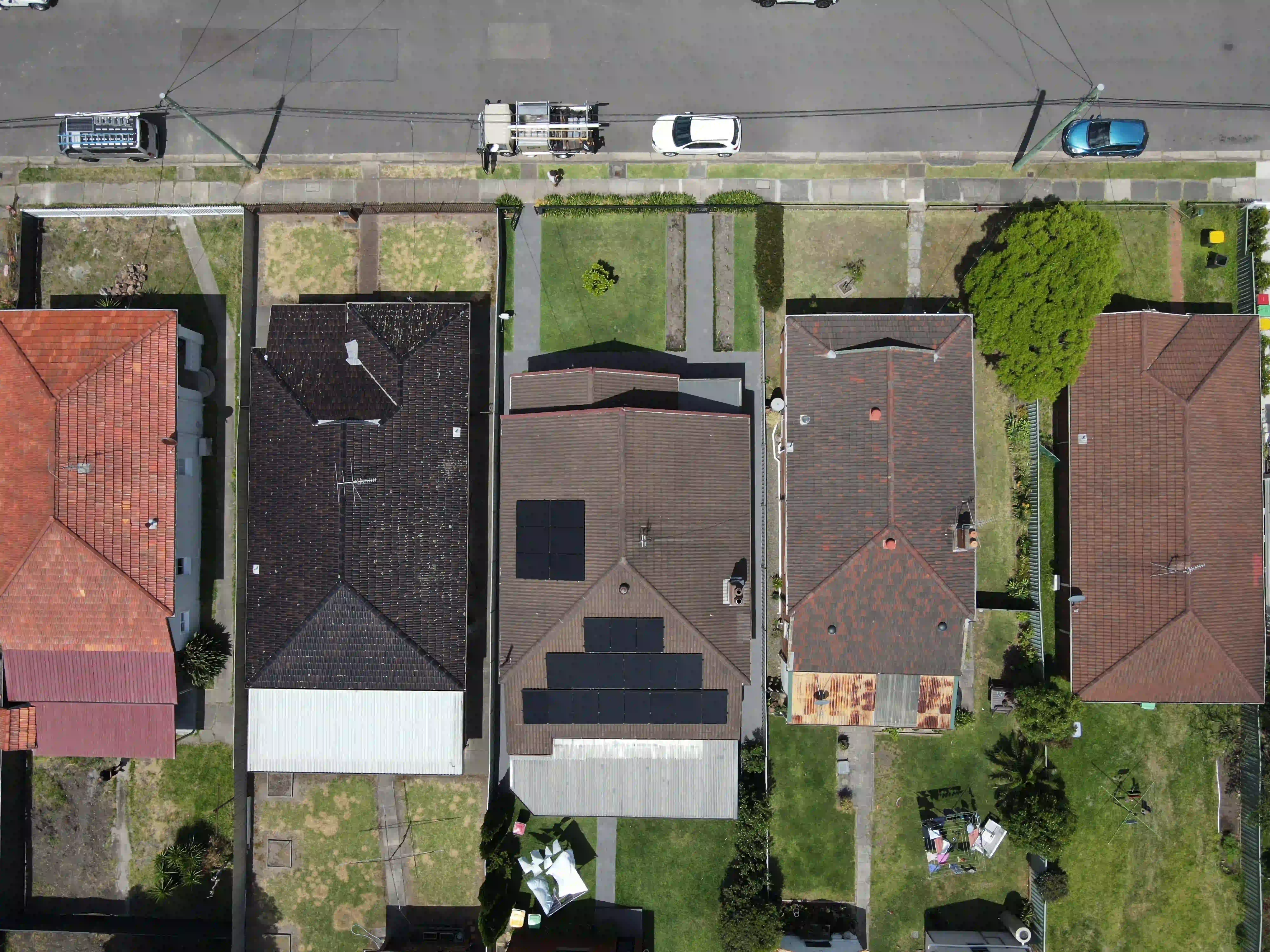 Aerial view of neat rows of solar panels installed on a Mayfield rooftop in Newcastle