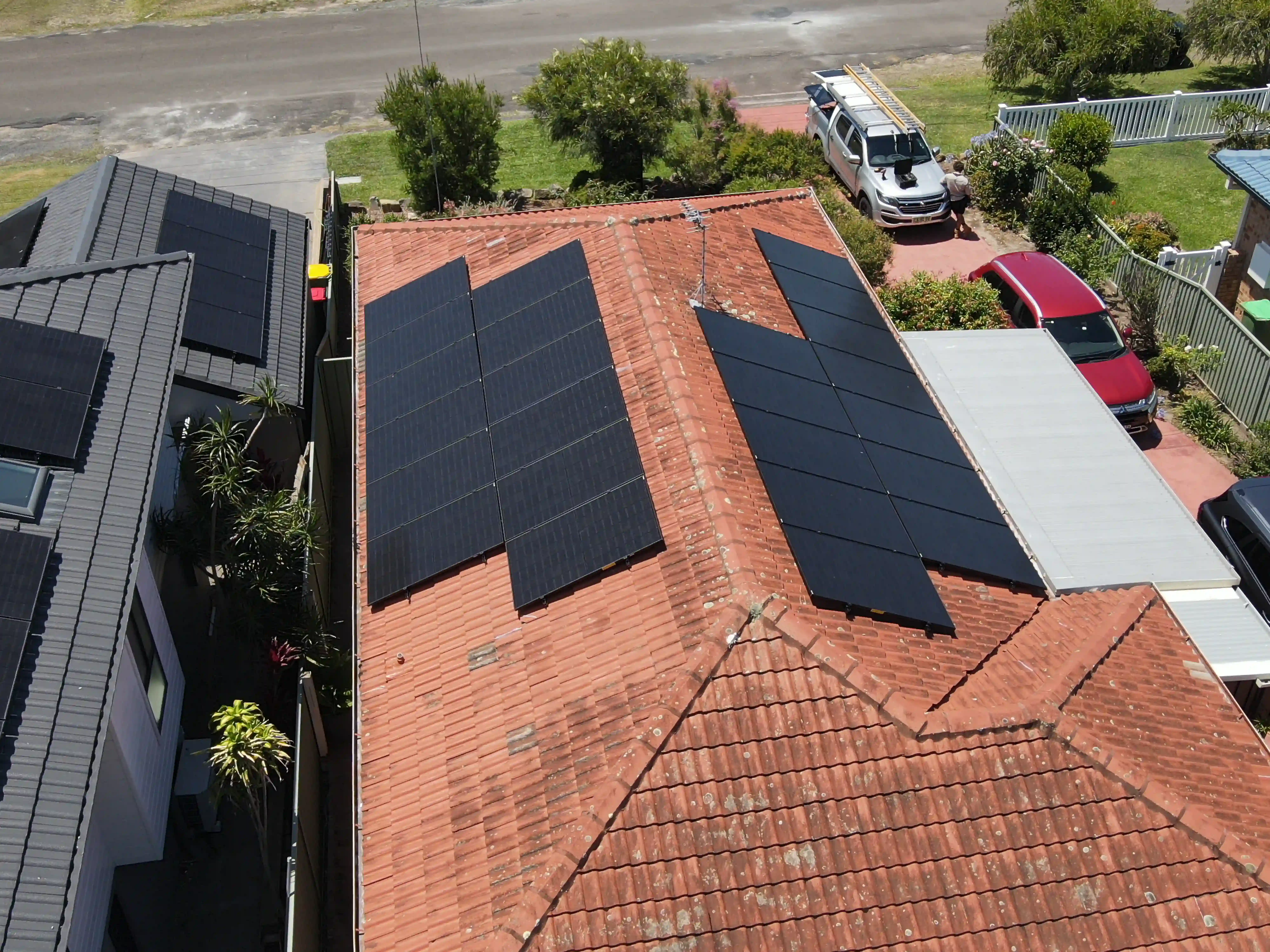 Drone view of rooftop solar panels installed by Newy Solar Co in Fletcher, Newcastle