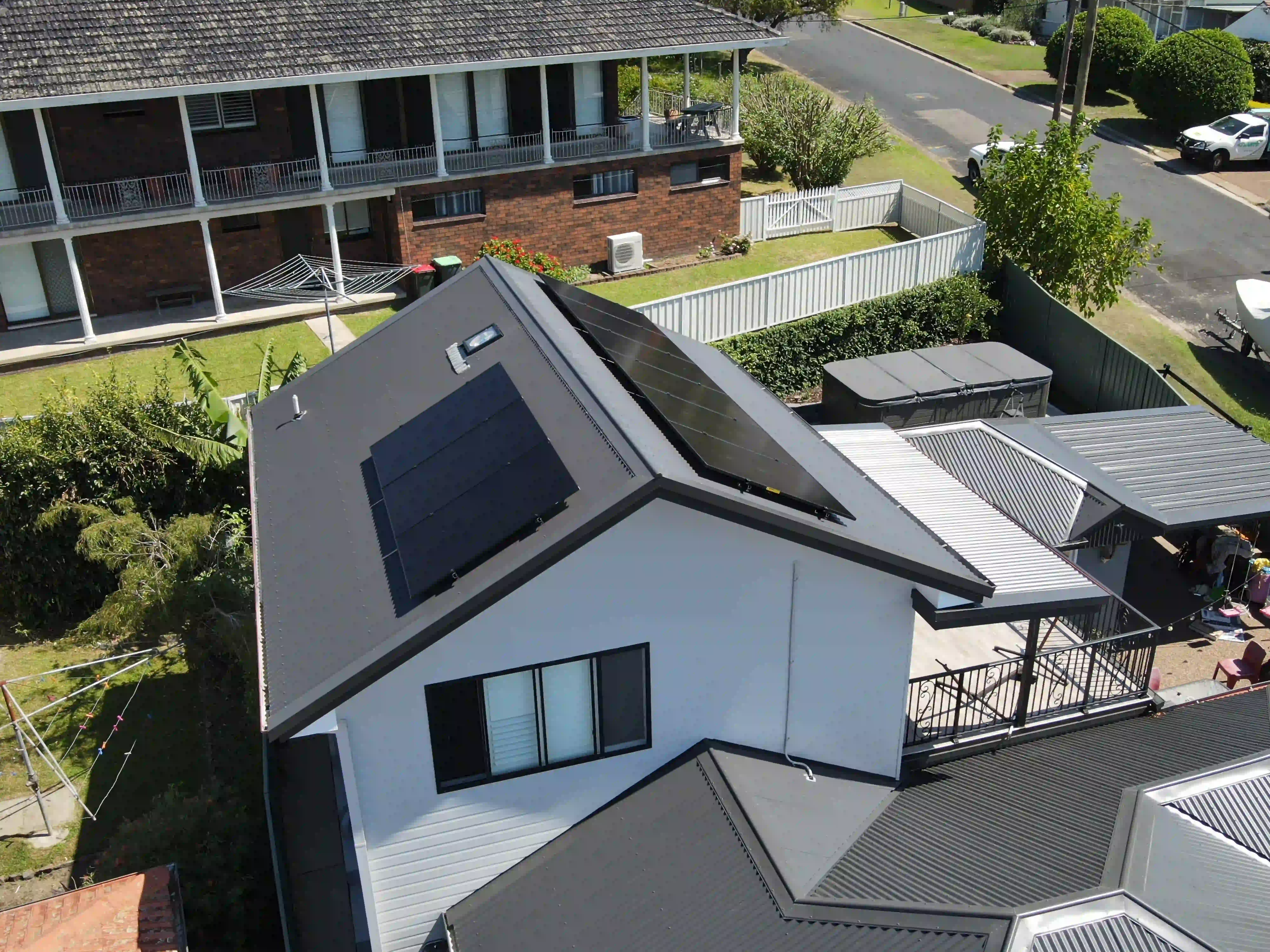 Overhead drone shot of a New Lambton rooftop solar installation by Newy Solar Co