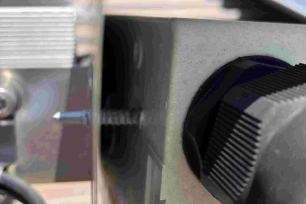 Dangerous DC Isolator showing a rooftop screw penetrating into the isolator