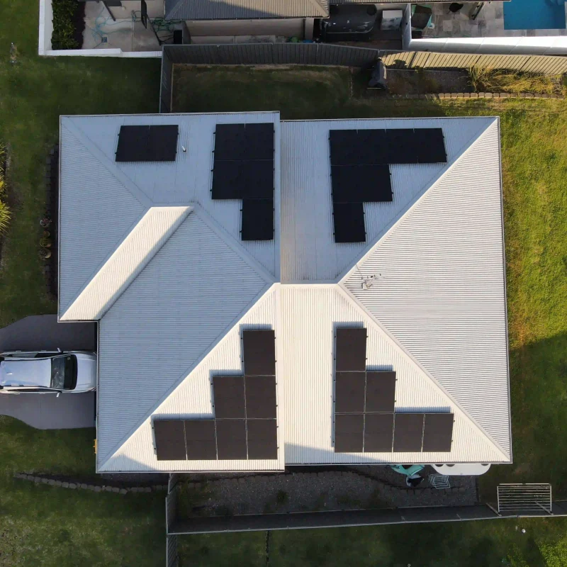 A perfect east-west solar array by Newy Solar Co. Notice how the eastern side is shaded and the western side is receiving the last of the afternoon sun