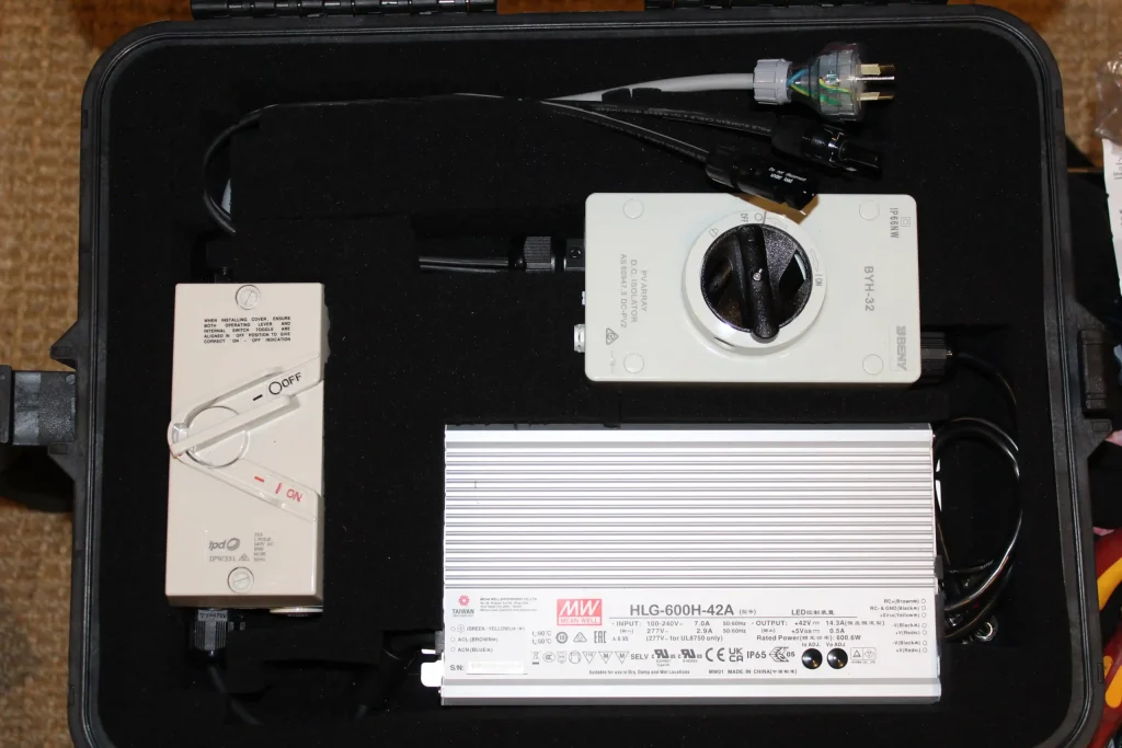 A power supply custom built by Eagle PV Labs showing a power supply and various isolators. This power supply can power a panel at night for the purposes of capturing Electroluminescence Imaging