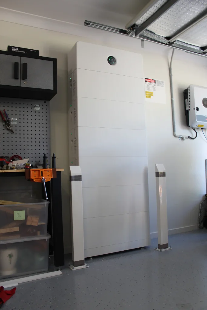 Completed Goodwe ESA battery system in Newcastle NSW with bollards and 10kw inverter